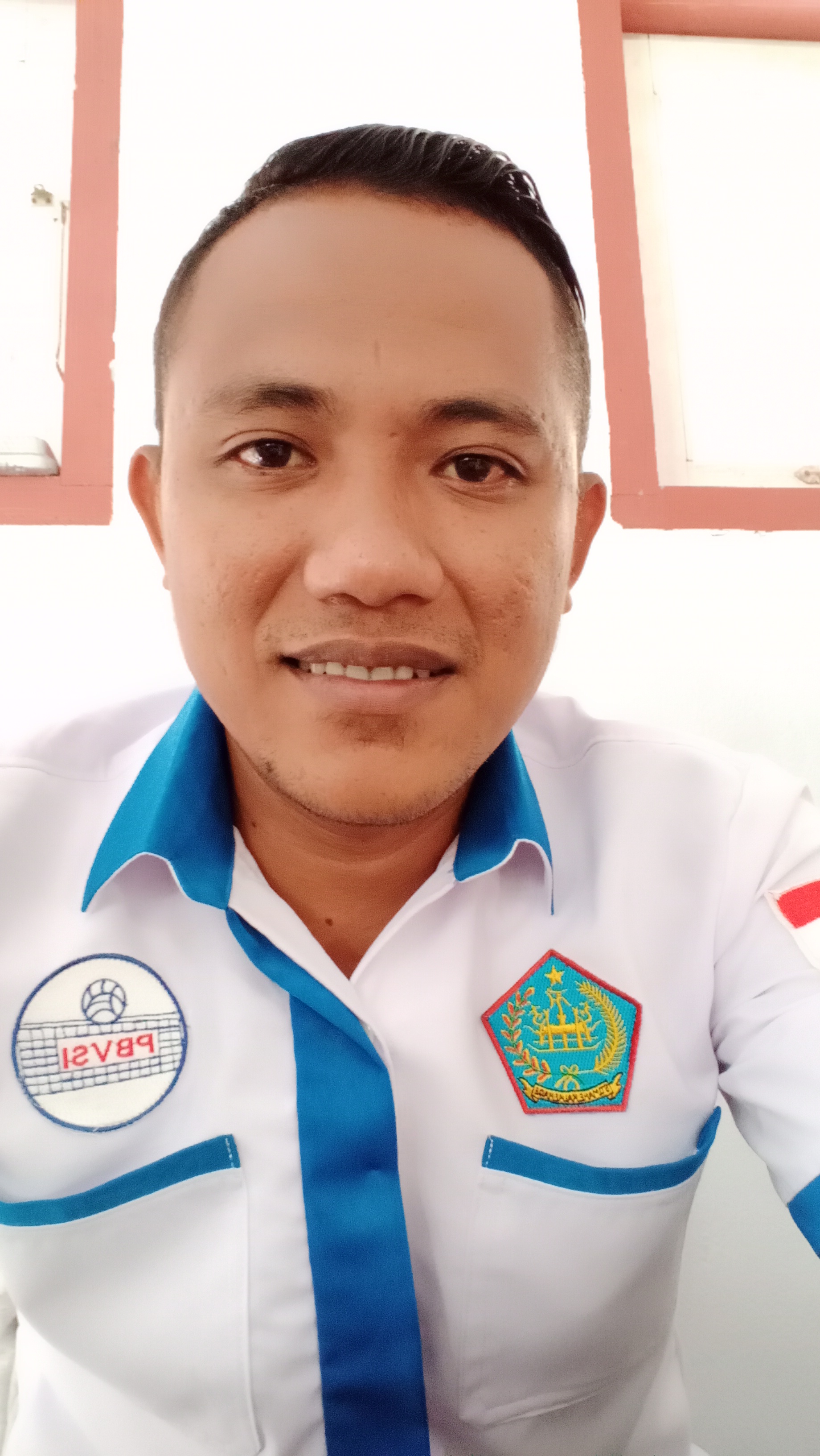 Foto FRAND RICHARD TINUNGKI S Pd